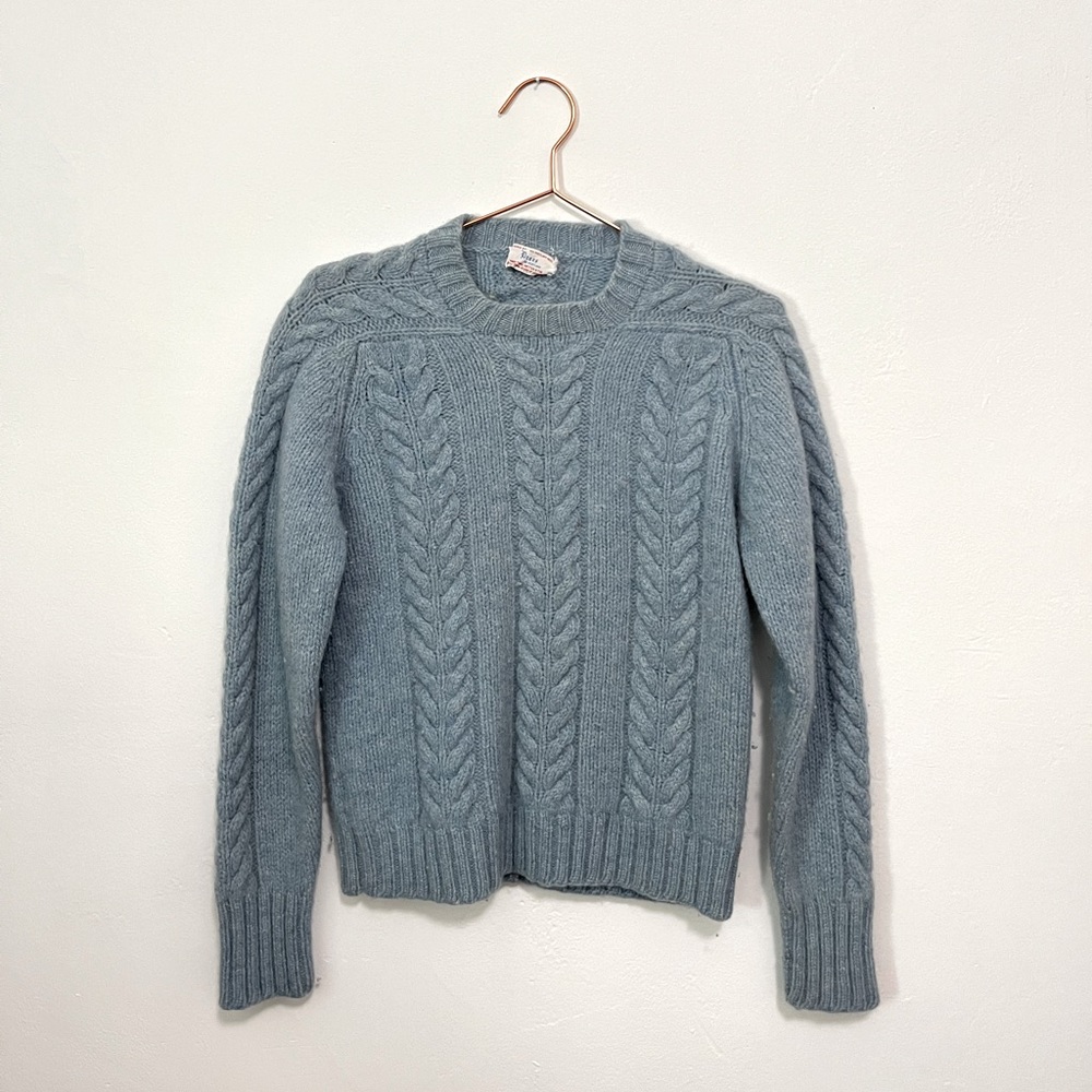 Blue knitted sweater